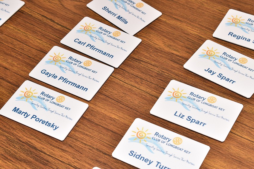 Members picked up their badges as they walked in.