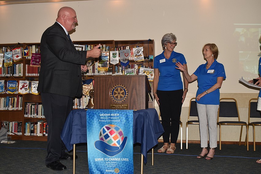 Andy Lyman welcomed new members Jill Hutzko and Jan Wallace.
