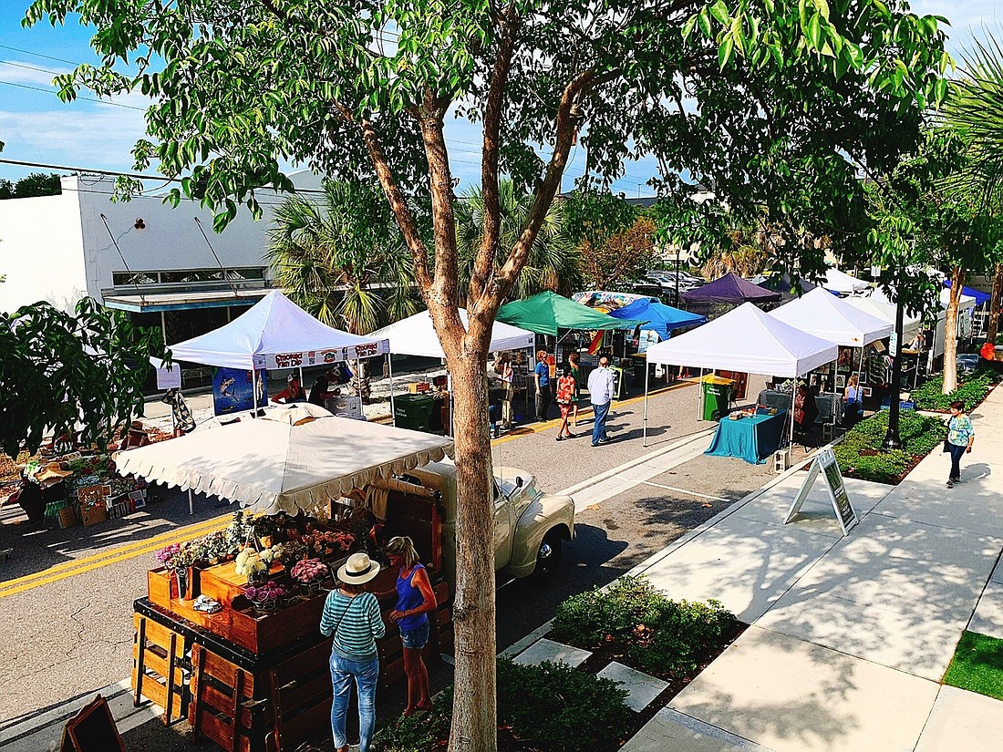 After launching this summer, rainouts scuttled plans for follow-up evening markets in the Rosemary District. Now, organizers say the event is back through next April. Photo courtesy DreamLarge