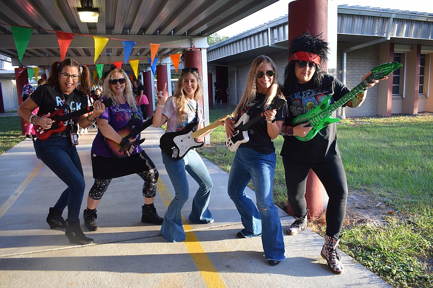 Kindergarten teachers Fran Vila, Shelly Askew, Noelle Bono, Kaehla Eidson and Claire Martin rock the '80s for Rock Our School Day.