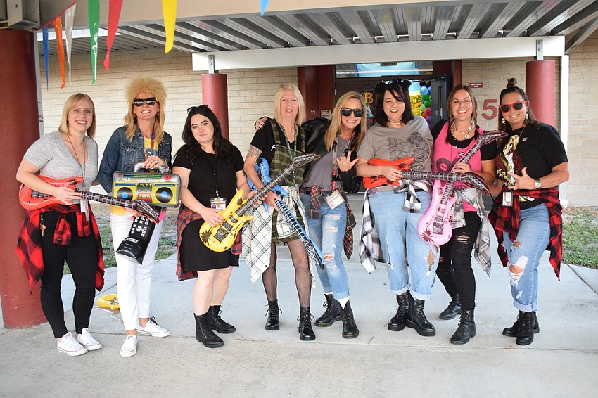 Fourth and fifth grade teachers rock out to Journey's 