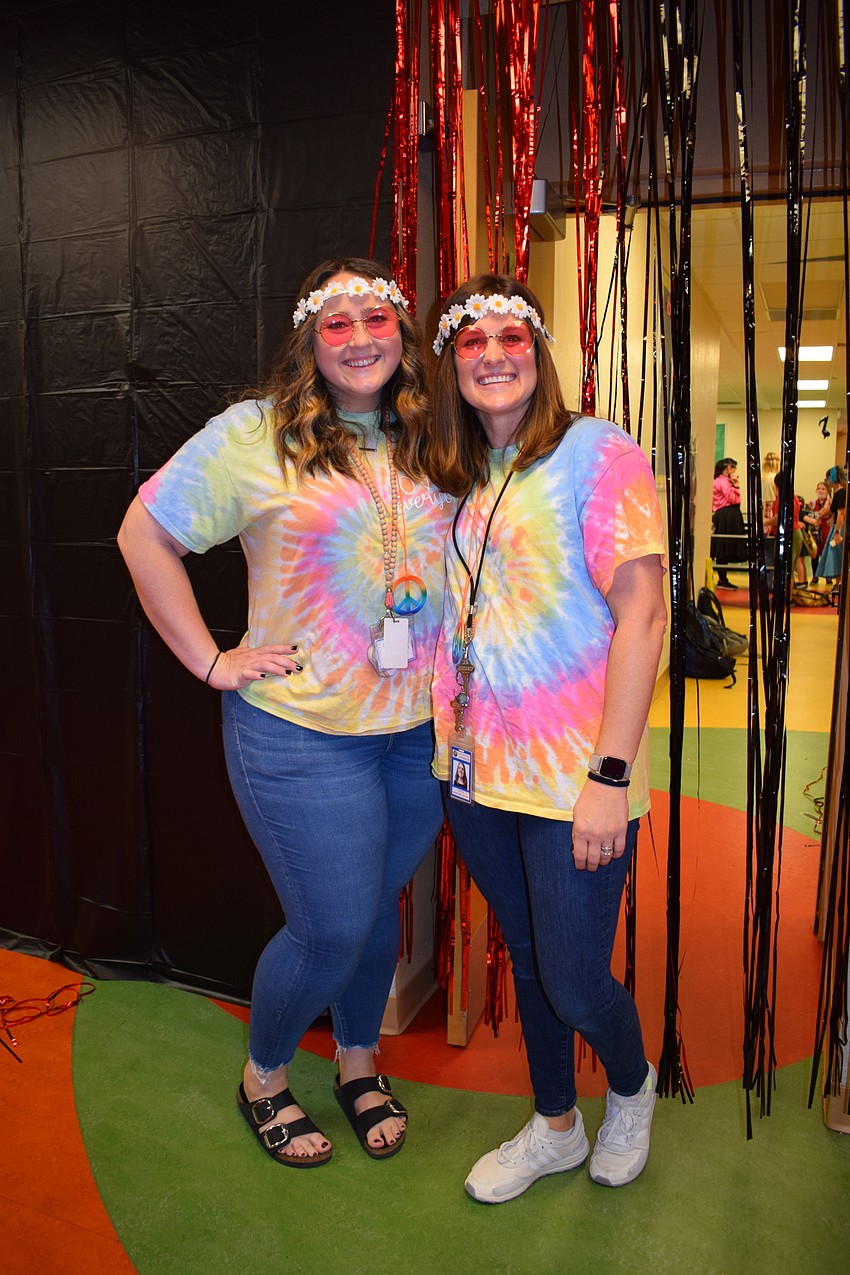 Jill Pendergast and Jackie Long, who are speech therapists, are excited to see the students engaged in Rock Our School Day.