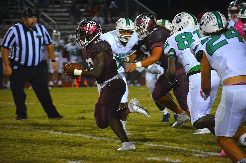 Sophomore running back Trayvon Pinder breaks through the Sumner defense. Pinder would leave the game with a knee injury.