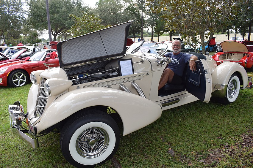 Apollo Beach's Tim  Dickson sits in his 1936  Auburn Model 876 Boattail Speedster. The replica was built in 1981 by California Custom Coach.