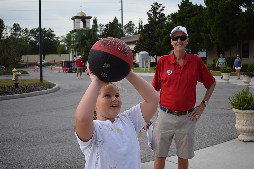 Heritage Harbour's Elizabeth Chambers, 9, made 8 of 15 shots in the basketball shoot contest.