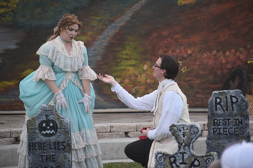 Ichabod Crane (Philip Troyer) asks Katrina Van Tassel (Brenna Griffith) to join him for a dance during Saturday's performance at the Sarasota Polo Club in Lakewood Ranch.