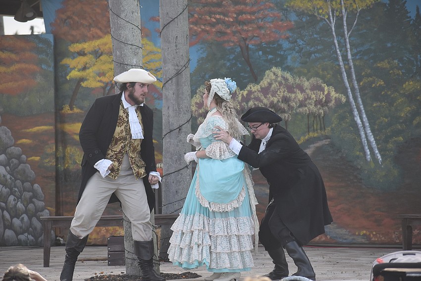 Brom Bones and Ichabod Crane battle for Katrina Van Tassel's affection in 