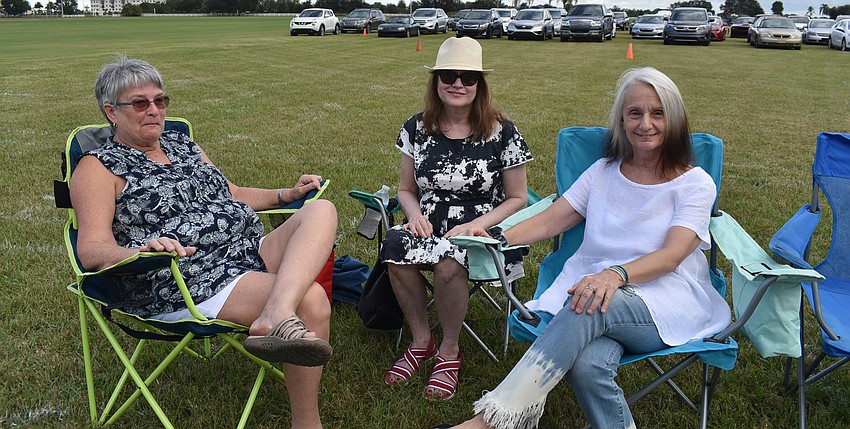 Patti Karabatsos of Sarasota, Carole Butera of Lakewood Ranch, and Margot McDaniels of Sarasota get ready for Saturday's performance of The Legend of Sleepy Hollow.