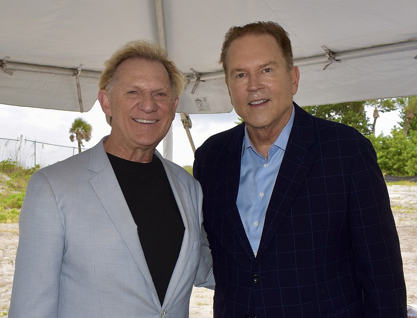 Michael Saunders & Co. Realtor Peter Salefsky chats with U.S. Rep. Vern Buchanan.