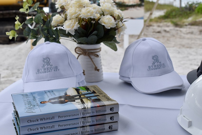Unicorp National Developments Corp. offered ballcaps and copies of CEO Chuck Whittall's book 