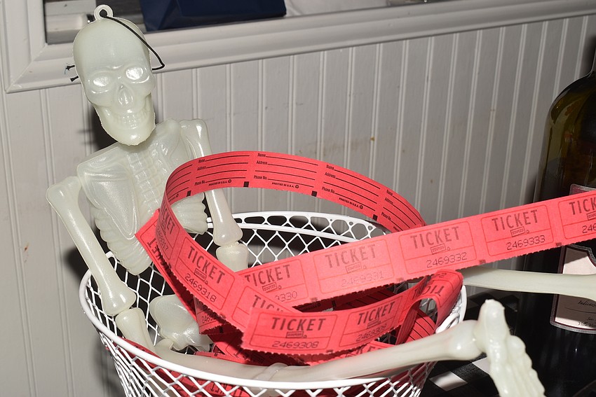 Attendees bought raffle tickets for door prizes, which were drawn from this skeleton's resting place.