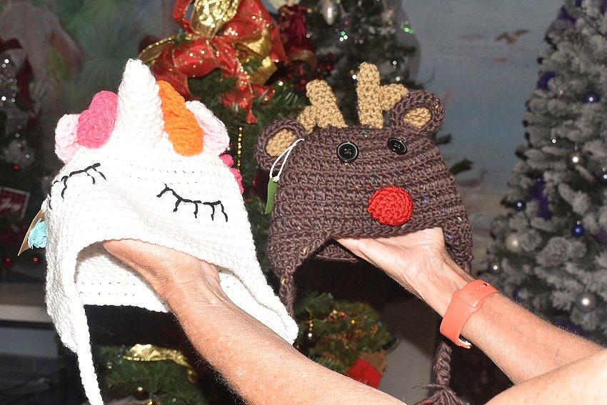 Volunteers knitted hats like these to sell as gifts.