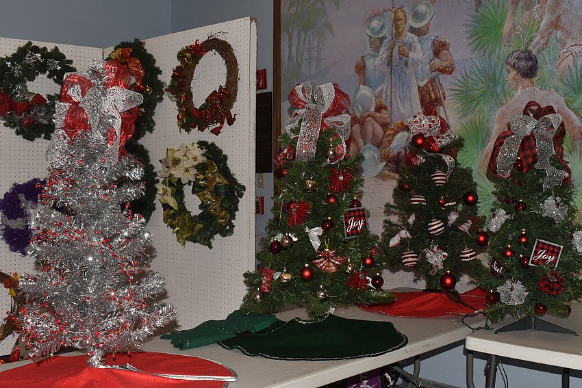 Small trees cover several tabletops in the fellowship hall.