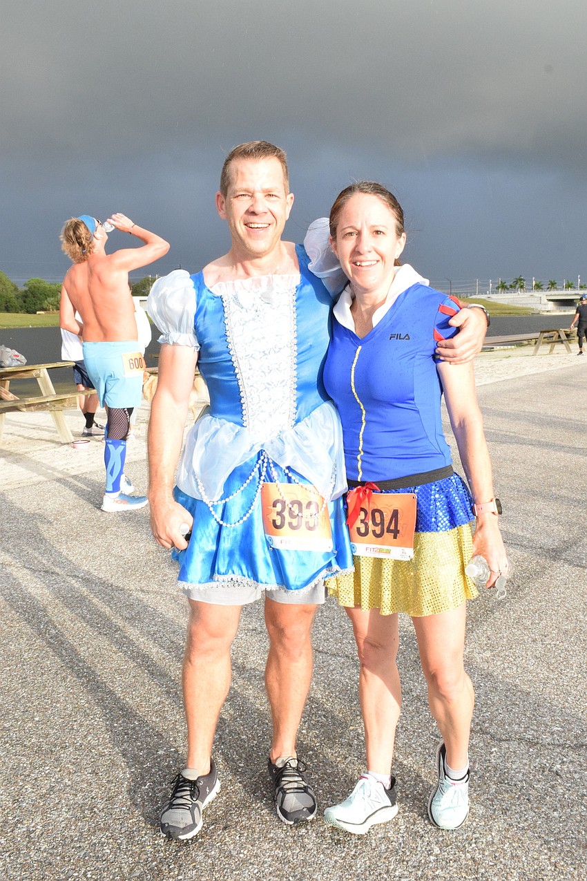 Sarasota's Michael Hinkin and his wife, Shannon Hinkin, dress as princesses together for the Boo Run.