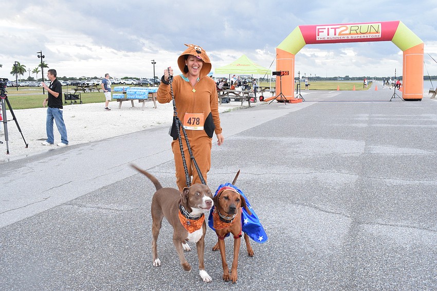 Lakewood Ranch's Rebekah Boudrie starts the race with her dogs.