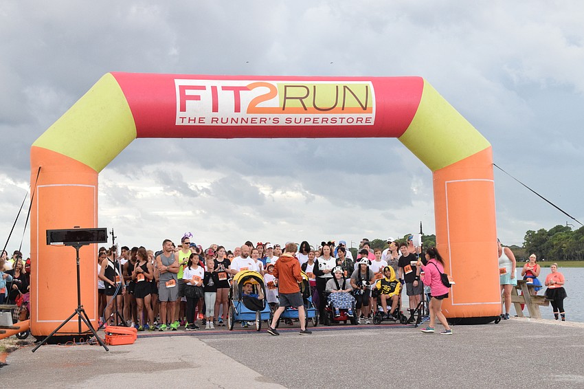 Boo Run participants wait at the starting line to begin the race.