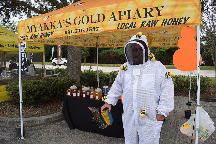 James Cutway, the owner of Myakka's Gold Apiary, didn't have to work hard to come up with his costume for Halloween.