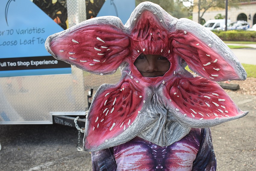 Bradenton 10-year-old Landon Horne peeks out from his Demogorgon outfit.