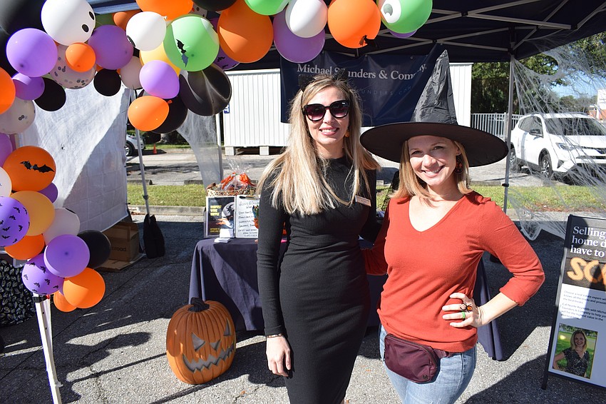Michael Saunders' Izzy Pollack and Noelle Reynolds were letting people know real estate transactions don't have to be spooky propositions.