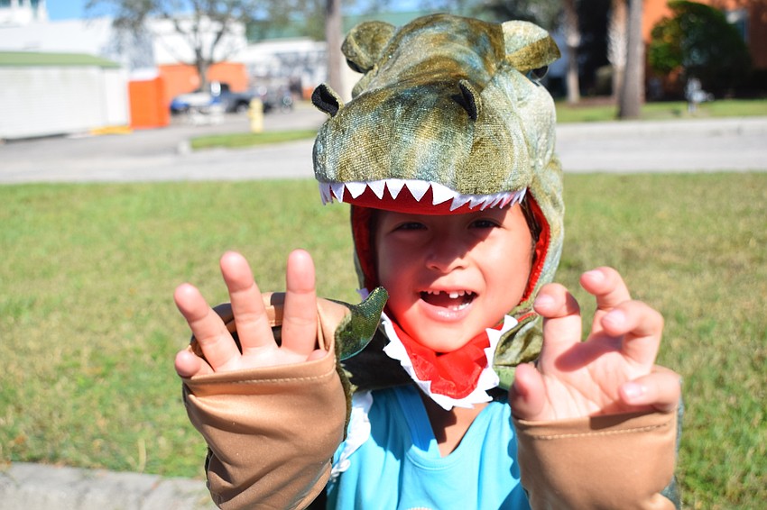 Venice 4-year-old Claire Del Rio did her best dinosaur during BooFest.