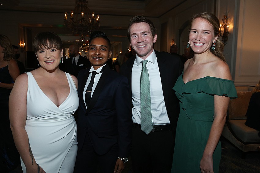 Danielle Ackerman and Sam Obeid with Isaac and Emily Huskins