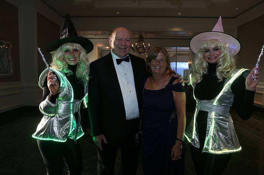 Ron and Betsy Koepsel posed with bright light models.