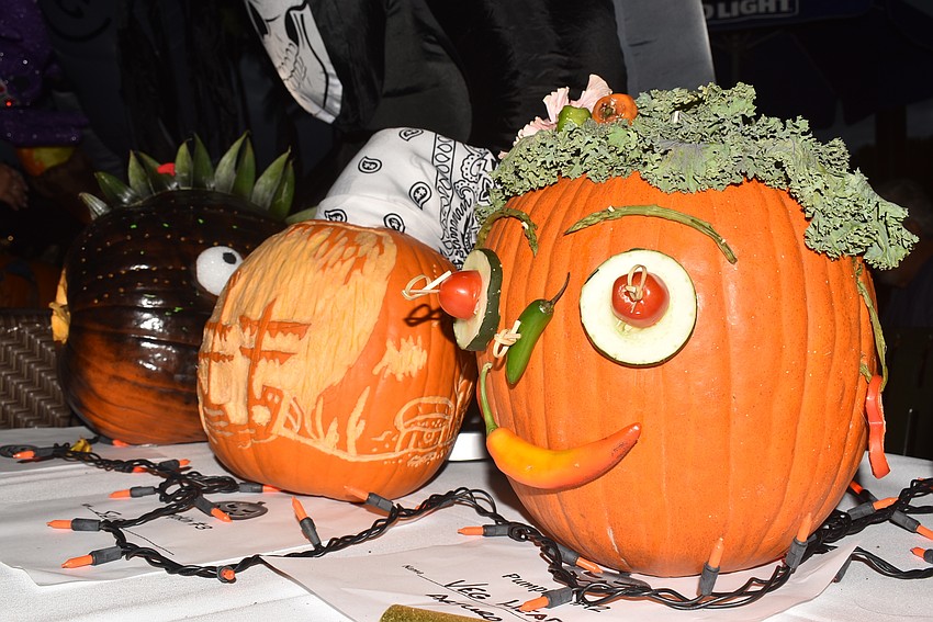 Crab and Fin had uniquely carved pumpkins out front.