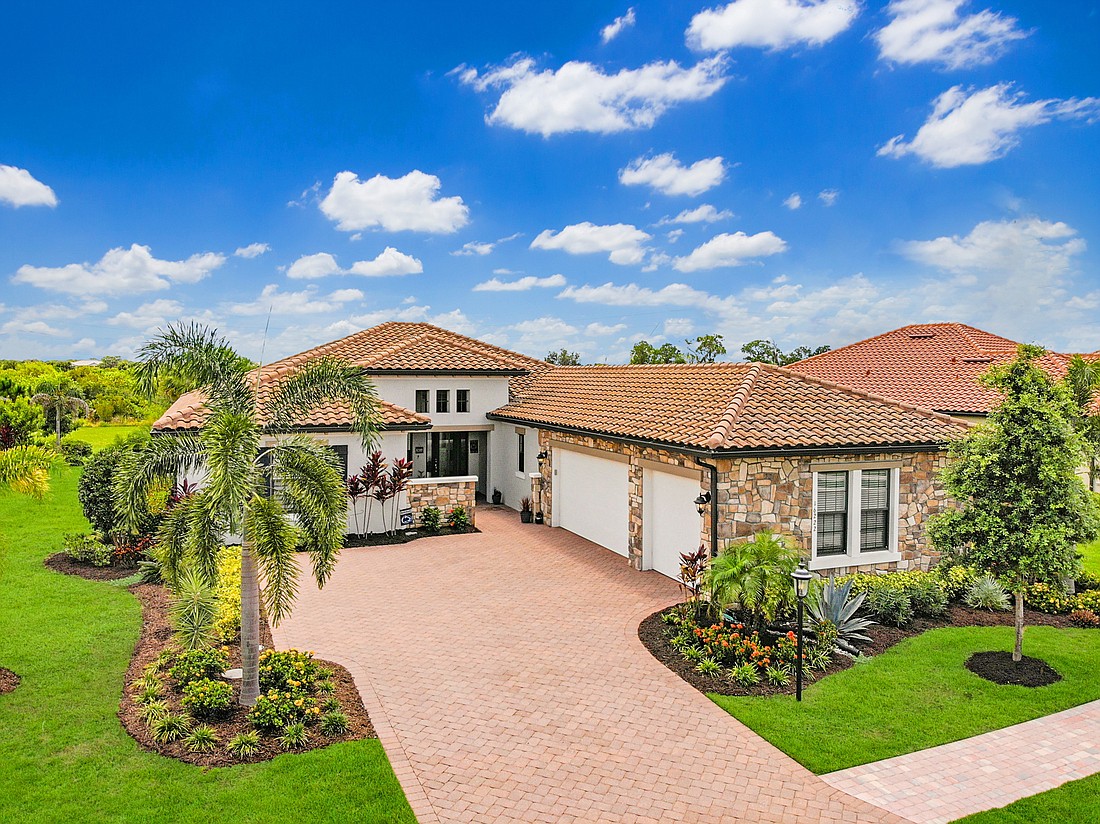 This Country Club East home at 16222 Castle Park Terrace sold for $1.29 million. It has three bedrooms, four-and-a-half baths, a pool and 2,785 square feet of living area.