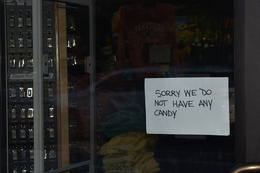 Some stores got ahead of inquiring trick-or-treaters and posted signs.