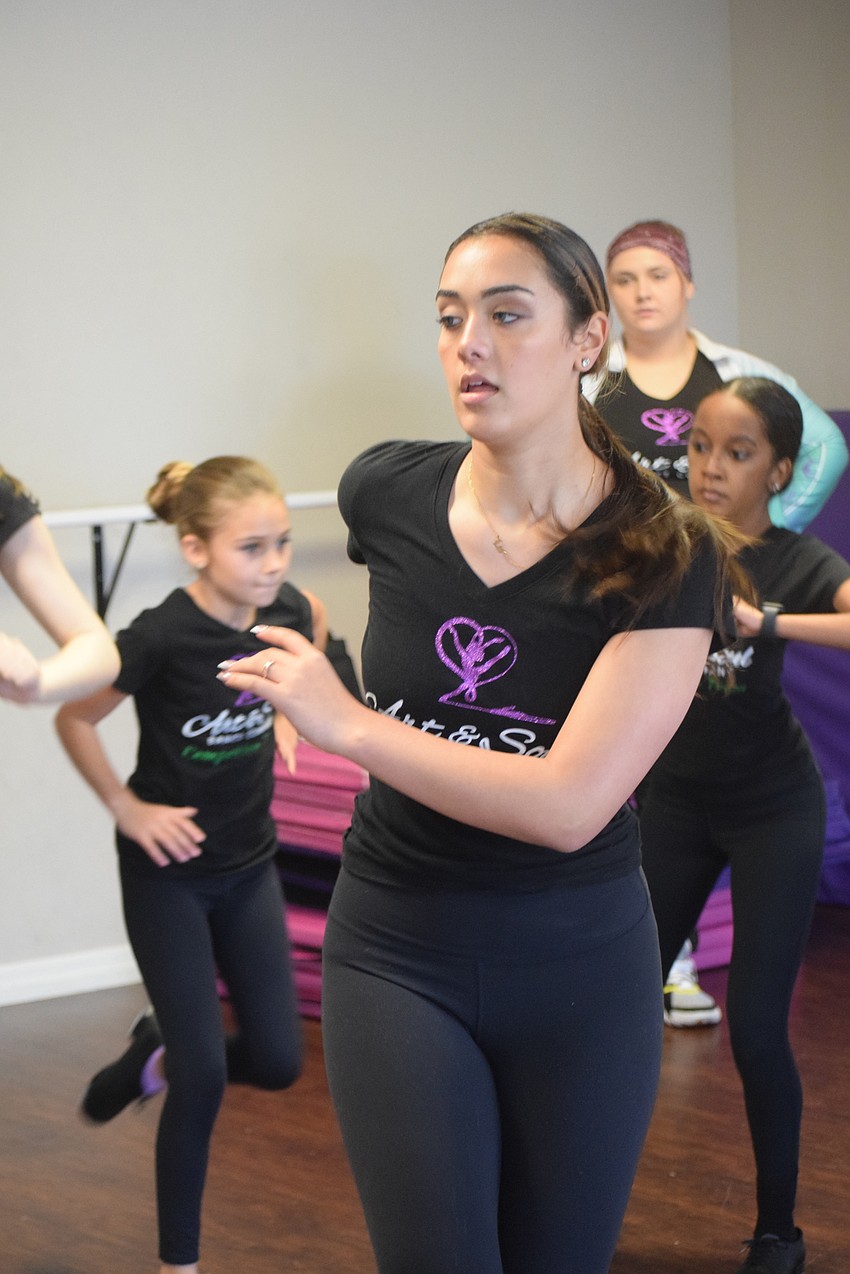 Kayla Downes says the hard work in practice makes the routines seem easy on stage.