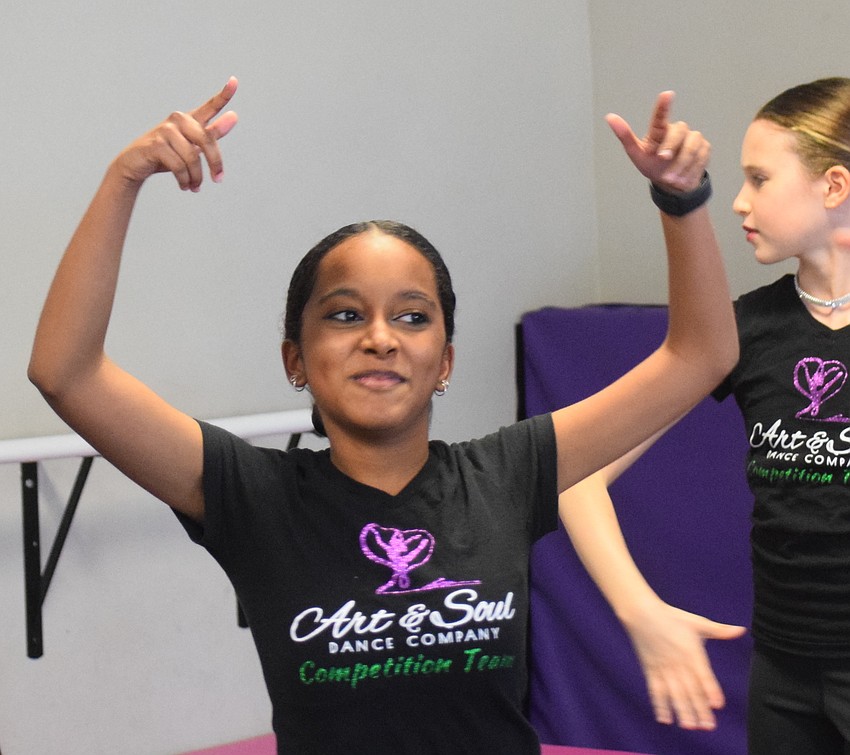 Mya Richard-Bennet shows off a little personality during a dance.