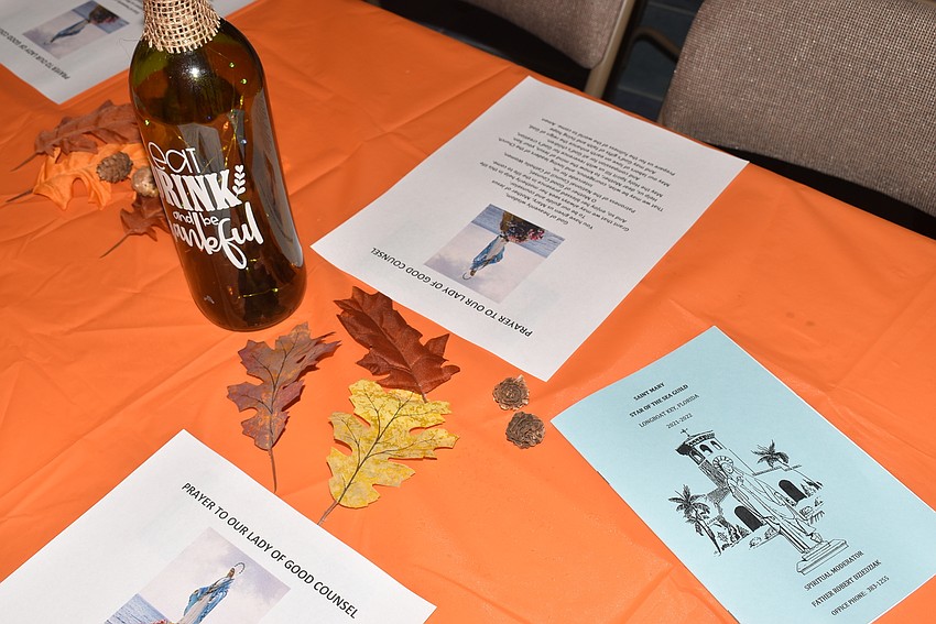 The tables were decorated with some festive fall garb, a program and