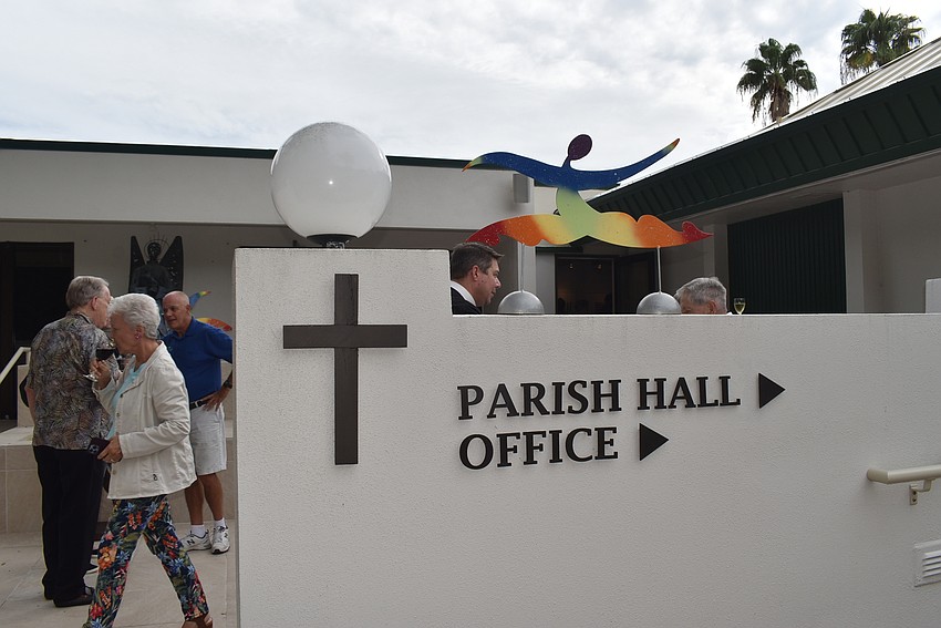 Pamela Olin put up three more statues outside before the reception.