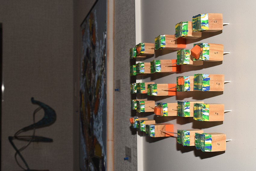 Olin's oeuvre was scattered around the gallery, and some made purchases.