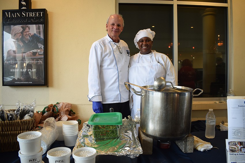 Mark Keckstein, the instructor of the culinary program at Manatee Technical College, and Brianna Brookins, an MTC culinary student, serve gumbo soup.