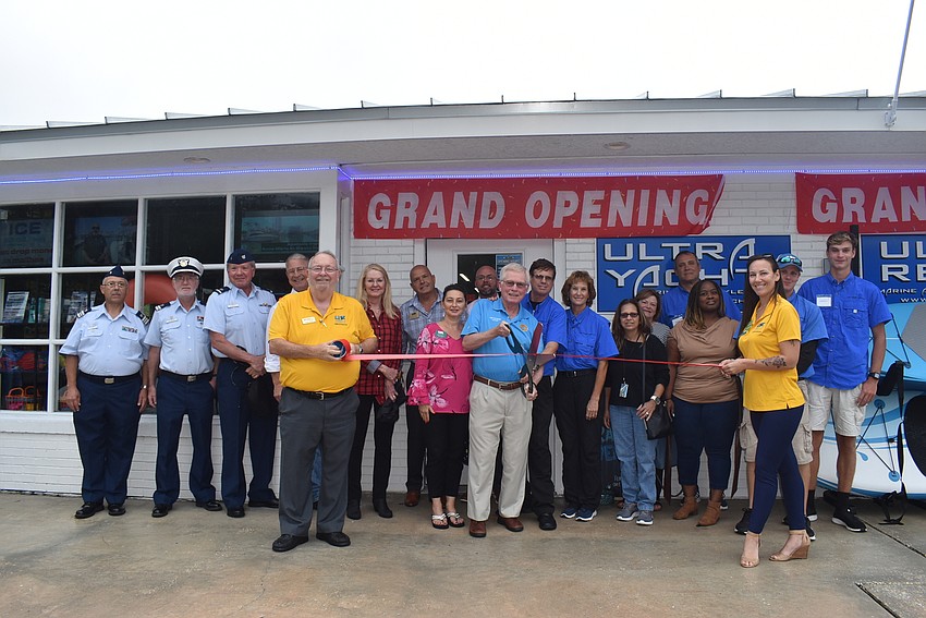Mayor Ken Schneier had the giant scissors.