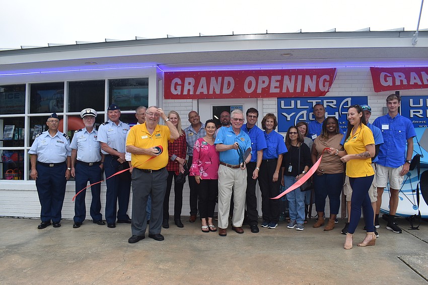 Terry and Ed Kolodzieski welcomed in as many as could fit for their ribbon-cutting.