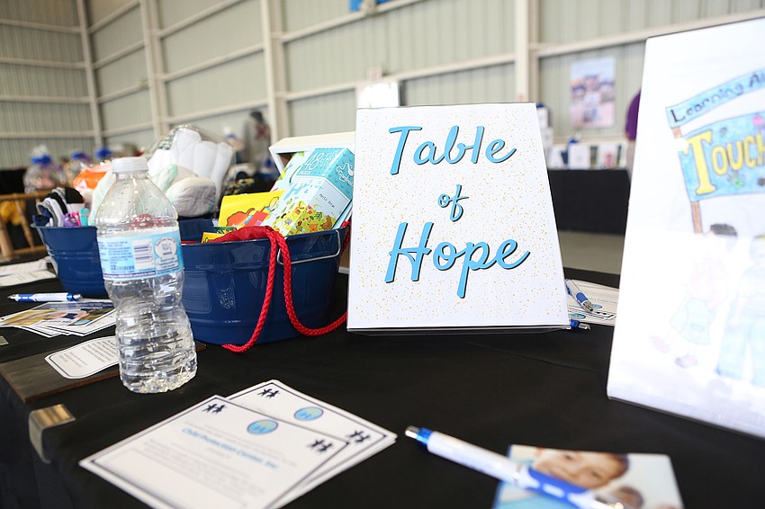 Guests bid on silent auction items.