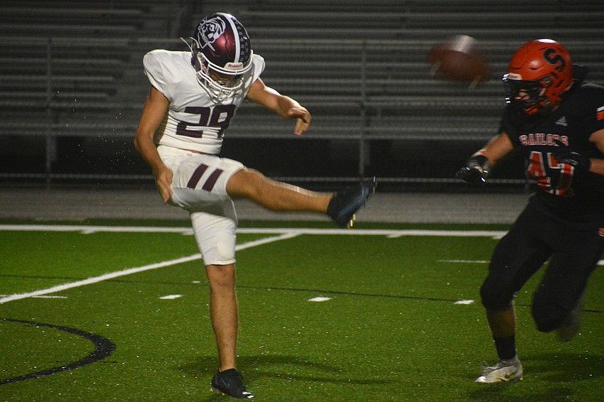 Braden River punter Thomas Urrutia-Bravo punts in the first quarter. The Sailors were called for running into the kicker on the play, extending the Pirates drive. The Pirates would end the drive with a Bryan Kearse touchdown run.