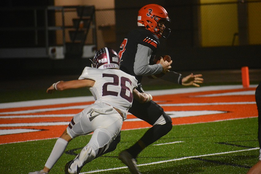 Braden River linebacker Andrew Nordland sacks Sailors quarterback Lance Trippel.