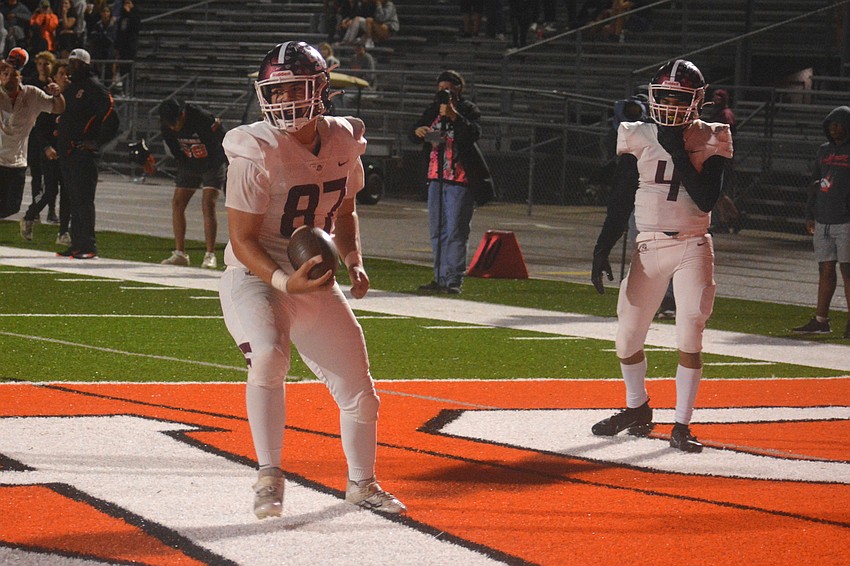Pirates tight end Cody Kawcak celebrates after catching a touchdown pass from Bryan Kearse.