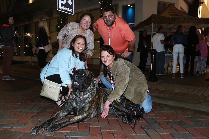 Duanna, Mark and Brianna Paquette with Michelle Barrett and Olive the dog.