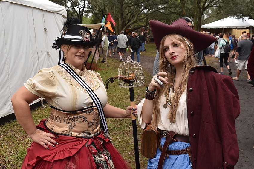 Jasmine Dennison and Josie Golish, both of Sarasota, make their traditional visit to the Sarasota Medieval Fair on Saturday.