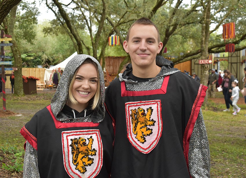Bailiegh Bockover and Nick York, both of Bradenton, wear matching costumes to opening day of the Sarasota Medieval Fair.