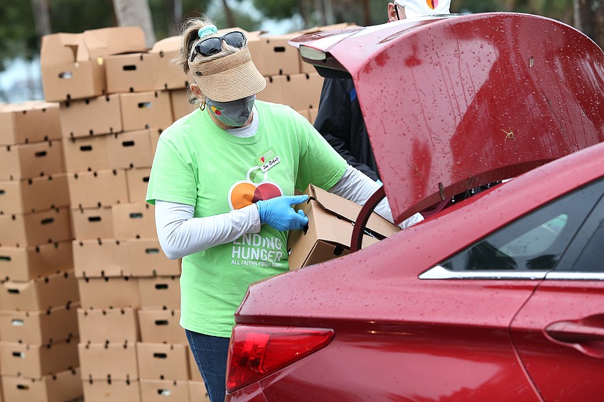 Sue Ziebell drops off a box