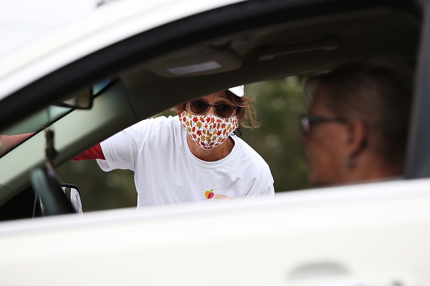 Maria Marin directs visitors on where to go.