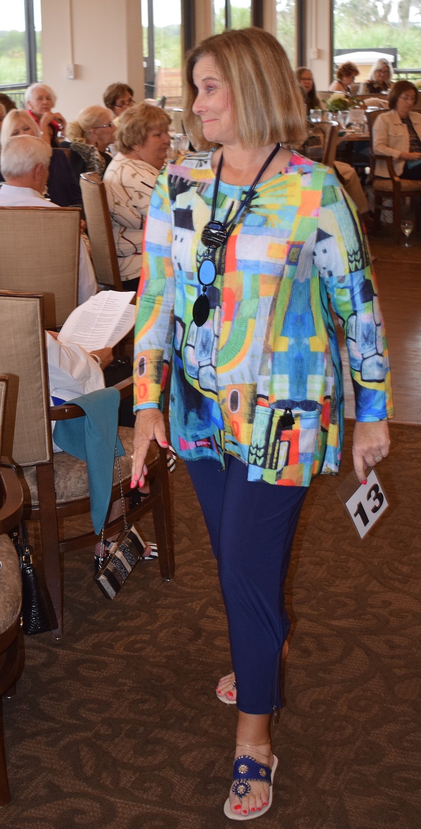 Amber Browne gives a little smile while interacting with the patrons.