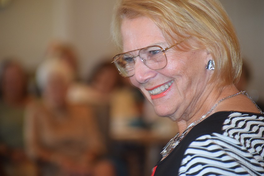 Pauline Dickson enjoys the audience's applause for her efforts.