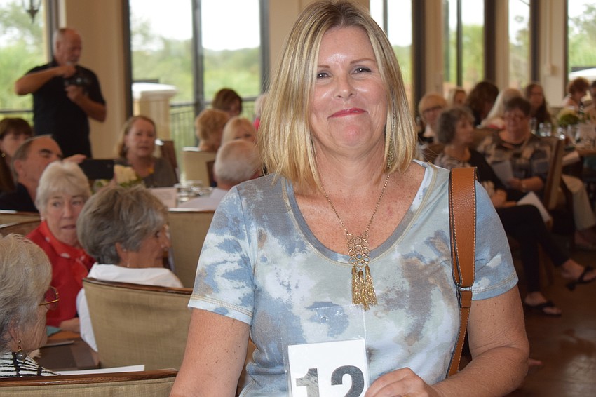 Jodi Carroll is glad another trip down the runway is over.