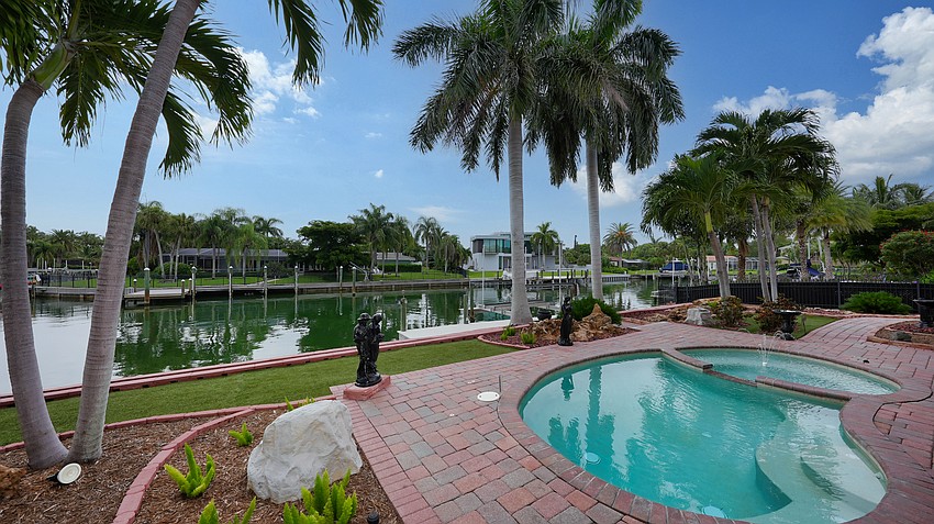 Brick pavers adorn the outdoor area.